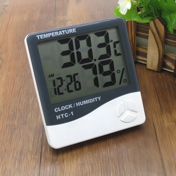 Termometr higrometr cyfrowy z zegarkiem budzikiem datą stojący na baterie 0-50C