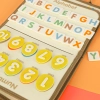 Tablica manipulacyjna sensoryczna montessori walizka dinozaury