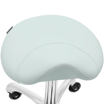 Taboret stołek hoker kosmetyczny siodłowy na kółkach York do 150 kg pistacjowy
